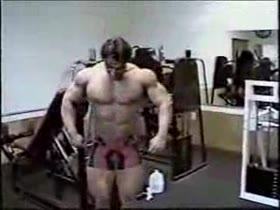 Pro Bodybuilder posing in Gym