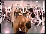 Nasser posing in the gym