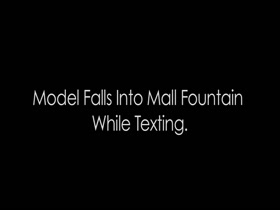 Hot Model Falls in Fountain