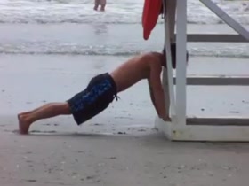 Hot Lifeguard workin' on his Fitness