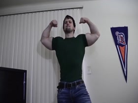 PowerBlue cocky flexing in green shirt