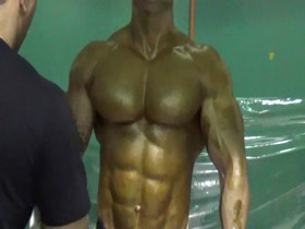 Iranian bodybuilder oiled by roller (WBPF)