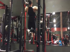 Joshua Vogel pull ups at the gym