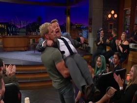 Corden flustered when carried by muscleman