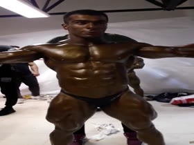 Muscle god working out backstage