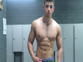 Hot guy flexing after workout