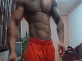 Very Hot Muscle Pup with Tats, Pecs and Abs - posing at home