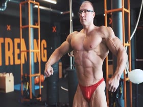 Pale Muscle Daddy Posing in Tight Trunks