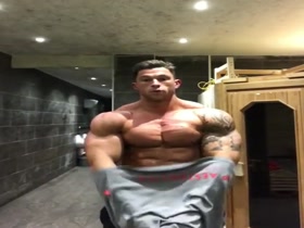 Huge and cut muscle god peels off and poses