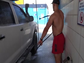 Muscular stud with big butt washing car