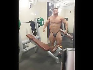 Sajad Niknam strips and poses in the gym