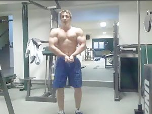 cute young muscle guy posing for the camera