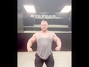 Short Gay Bodybuilder Flexing
