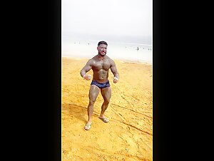 Brazilian Bodybuilder covered in Mud