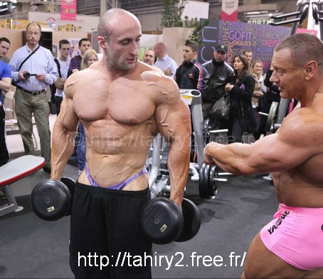 David Gasser at Fitness Expo wearing posing trunks underneath