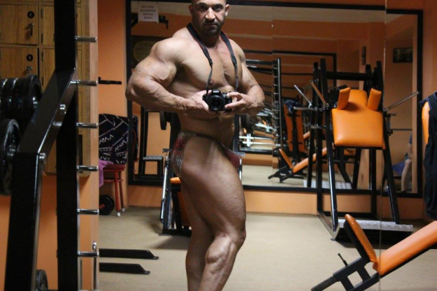 Super hung bodybuilder with extreme posers bulge
