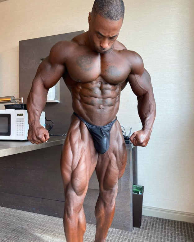 Skimpy posers, a monster bulge and massive muscles: Detric Lewis