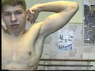 Russian Teen flexing in the gym.