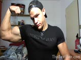 Young bodybuilder flexes on cam