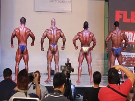 Sexy bodybuilder competes in a thong!