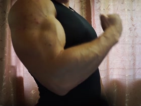 Russian MuscleGod flexes massive muscles