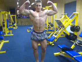 Young Tomas Horak posing at gym