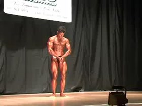 Muscle teen Sean Susini posing routine at Hercules Contest