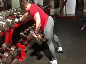 Young and cute bodybuilder Josh does dumbell rows