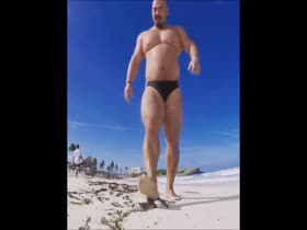 Massive muscle on the beach