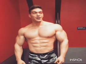 babyface bodybuilder working out