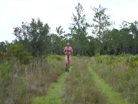 Muscle grey man runs