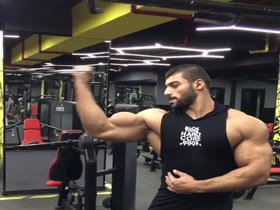 Tall Bodybuilder with Super Biceps