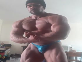 Buff bodybuilder in extremely hot posers