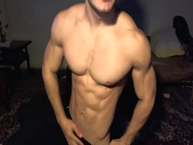 Young Muscle Hunk Skyping and Posing