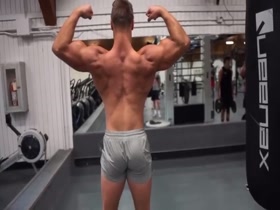 Ryan Dengler poses in college gym