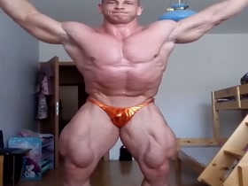 Tiny Copper Poser and Huge Double Bicep Muscle God