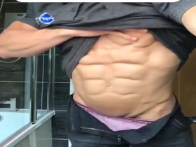 Letting Us Peek - those abs and pecs!