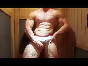 Sweaty  Aussie muscle in the sauna