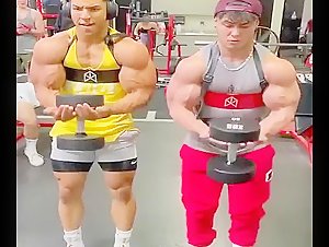 Huge musclemen with xtremly huge massive biceps