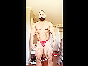 Perfectly chiseled bodybuilder with hot bulging brief and powerful muscles