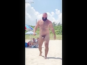 Hairy muscle bull at the beach
