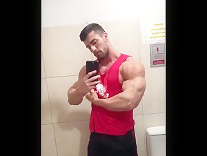 please ID him - biceps posing