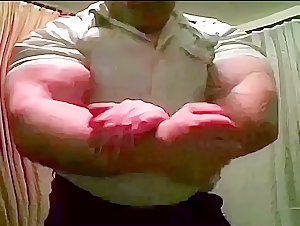 Massive Biceps in tight T-Shirt II