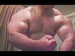 Massive Muscleman flexing his big Muscles…