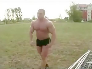 hungarian powerlifter bulls in the field, with an impromptu pose-off
