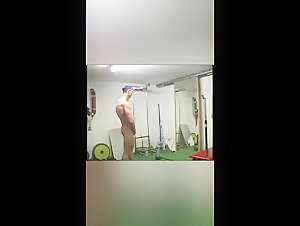 College Muscle Admires Himself in Mirror