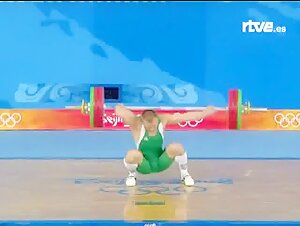 Muscled weightlifter in pain after failing at the Olympics