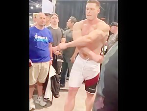 Bodybuilder Flexing For His Servants