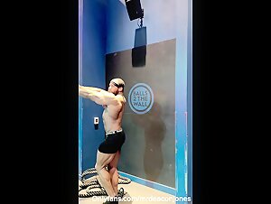 Flexing hard, posing muscle