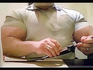 Massive Biceps in ultra-tight Shirt